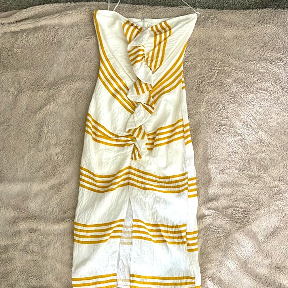 Gold stripe strapless dress.
